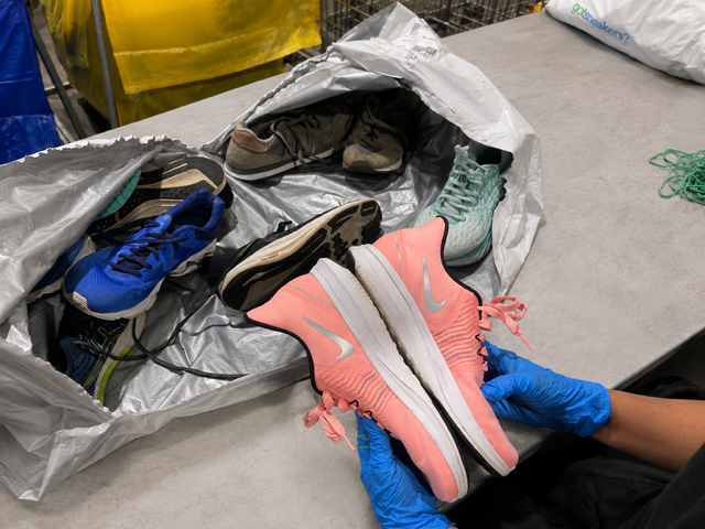 Sneakers inspected by hand and scanned for grading
